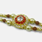 Jewel Studded Round Shape Flower Design Rudraksha and Beads Jewel Rakhi for Brother