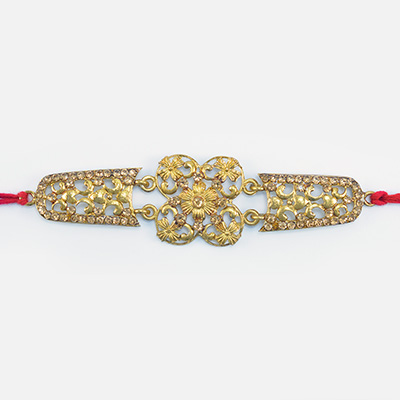 Uniquely Crafted Golden Color Jewel Studded Marvelous Design er Rakhi