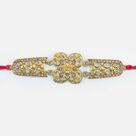 Uniquely Crafted Golden Color Jewel Studded Marvelous Design er Rakhi