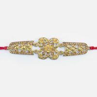 Uniquely Crafted Golden Color Jewel Studded Marvelous Designer Rakhi