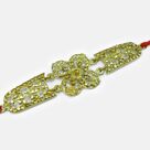 Uniquely Crafted Golden Color Jewel Studded Marvelous Designer Rakhi