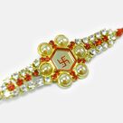 Swastika On Gold Base Pearl and Jewel Studded Attractive Looking Jewel Rakhi