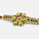 Swastika On Gold Base Pearl and Jewel Studded Attractive Looking Jewel Rakhi