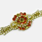 Flower Shape Dotted Shining Jewel and Pearl Rakhi