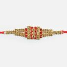 Bunch of Jewel Dotted on Golden Base Antique Jewel Rakhi for Brother