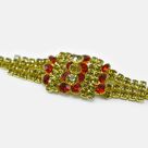 Bunch of Jewel Dotted on Golden Base Antique Jewel Rakhi for Brother