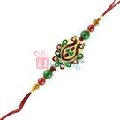Kundan Filled 2 Golden Peacocks Designer Jewels Rakhi with Maroon Beads