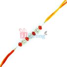 Alluring Diamond Rakhi with Red and White Diamonds in Moli Dori