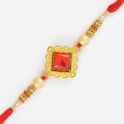 Craftly Designed Golden Base Moli Rakhi with Kundan Stones