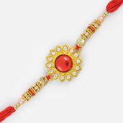 Floral Designed Golden Base Moli Rakhi with Kundan Stones