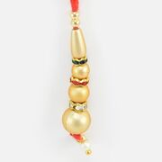 Golden Beads and Colored Jewel in Mauli Liner Lumba Rakhi