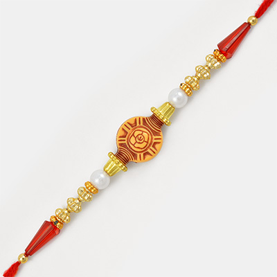 Sandalwood Designer Rakhi with Pearl and In Red Thread
