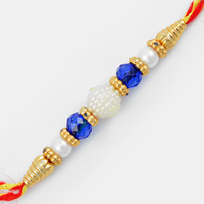 White Pearl and Red Beads Golden Maulti Rakhi