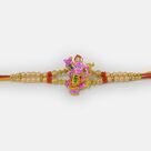 Pink Colored Lord Krishna Rakhi with Mauli Base