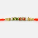Red and Green Beads Mauli Rakhi with Golden Base Diamonds