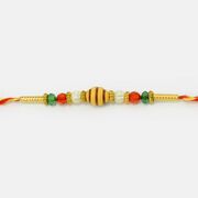 Oval Shape Brown Lining Base Mauli Rakhi 