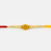 Sindoori Om on Yellow Color Base Mauli Rakhi with Pearl 