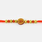 Round Shape Golden Base Red Om mauli Rakhi