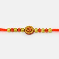 Round Shape Golden Base Red Om mauli Rakhi