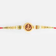 Shri Ganesha On Circular Base Pearl and Jewel Mauli Amazing Rakhi