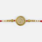 Golden Base Swastik studded Diamond Pearl Rakhi with beads
