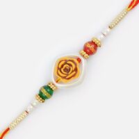 Wonderful Brown Shaded Flower Type Pearl Rakhi