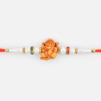 Striking Brown Shaded Ganesha Pearl Rakhi