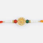 Majestic Central Golden Om Base Pearl Rakhi