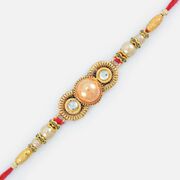 Spectacular Golden Designed Embossed Pearl Rakhi