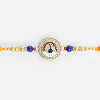 Peacock on Coin Shape Blue Rakhi with Some Pearl in Mauli Special Rakhi