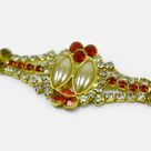 Amazing Shining Jewel Studded Marvelous Pearl Rakhi