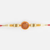 Shri Ganesha Emerged on Wood Golden Color Beaded Pearl Rakhi