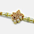 Jewel Studded New Ganesha Design Amazing Pearl Rakhi