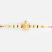 Om Written on Golden Tortoise Divine Beaded Peal Rakhi for Brother