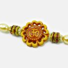 Awesome Looking Om Written Wooden Flower Shape Pearl Bhai Rakhi