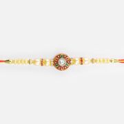 Jewel In Mid of Meena Work Base Stunning Looking Pearl Rakhi