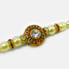 Jewel In Mid of Meena Work Base Stunning Looking Pearl Rakhi