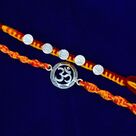 Om and Small Coins Shape Design Auspicious Pure Silver Rakhis Set of 2