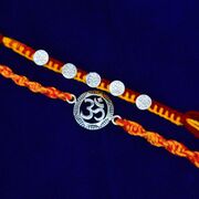 Om and Small Coins Shape Design Auspicious Pure Silver Rakhis Set of 2