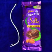 Liner Simple Looking Pure Silver Rakhi with Roast Almonds Cadbury Chocolate