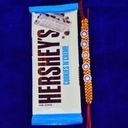 Hersheys Cookies n Cream Chocolate with Mauli Thread Floral Shape Rakhi for Brother\