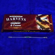 Harveys Crunchy and Creamy Chocolate with Beads Designer Pure Silver Rakhi