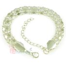 Zesty Silver Rakhi Bracelet with Shining Plait Work