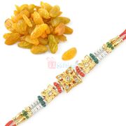 Delicious Kishmish with Designer Golden Rakhi Hamper