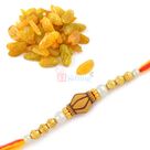 Exclusive Hamper of Tasty Kishmish and Designer Beads Rakhi