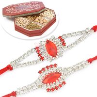 Awesome 2 Silver Jewel Rakhi Set with 6 type Dryfruits Box
