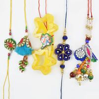 Two Mauli Rakhi Set with Apricot Dryfruits Hamper