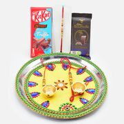 Delicious Chocolates with Beaded Amazing Rakhis and Yellow Base Designer Puja Thali