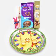 Awesome Looking Puja Thali with Rakhis and Silk Oreo Ferrero Rocher Chocolates
