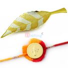 Leafy Designer Shahi Brass Serving Utensil with Golden Ganesha Coin Mauli Rakhi